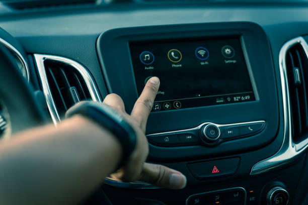 istock Asian man hand with smart watch touching screen in modern car 1173116068