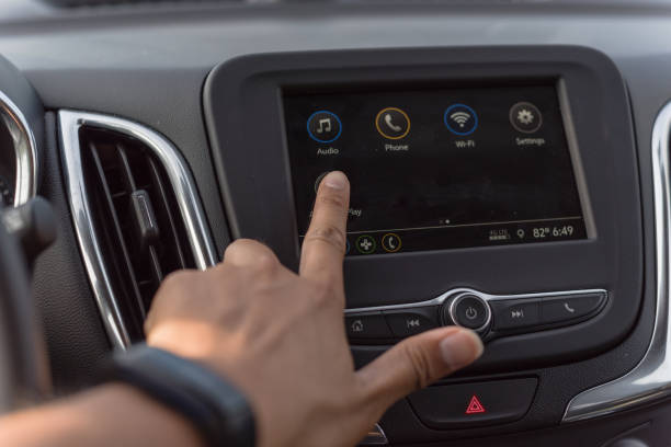 istock Asian man hand with smart watch touching screen in modern car 1173116080