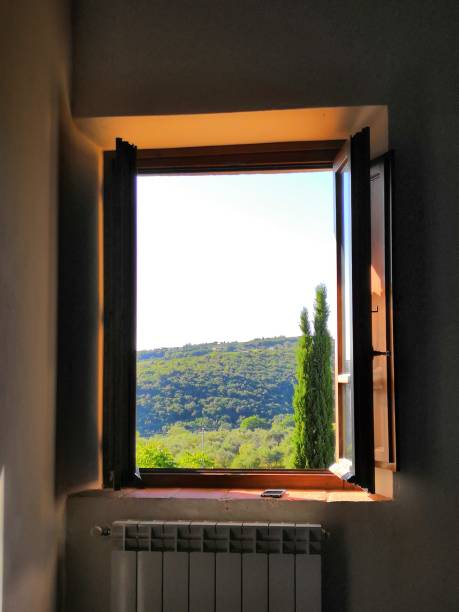 View out of bedroom into tuscan Landscape
