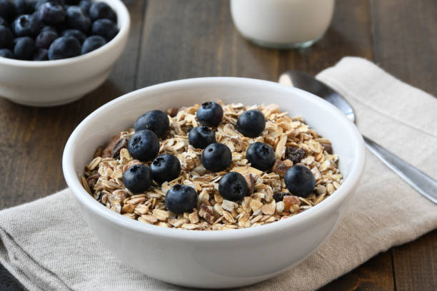 Healthy, organic homemade muesli topped with blueberries