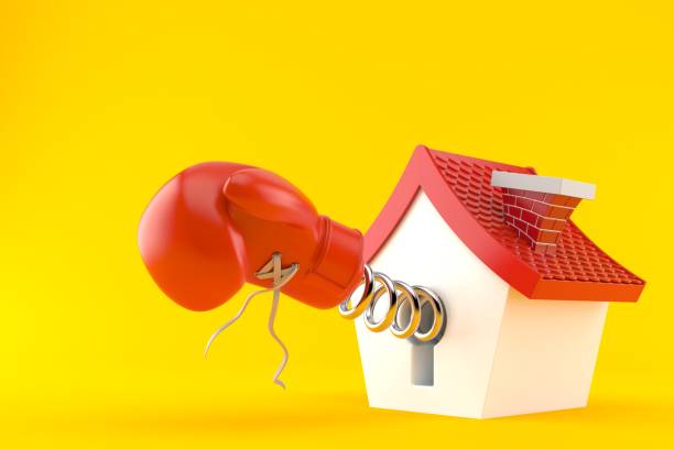 istock Cartoon house with boxing glove 1173125284