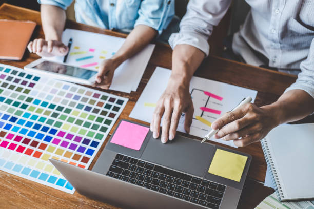 istock Team of Creative Web/Graphic Designer planning, drawing website ux app for mobile phone application and development template layout, process to developing prototype wireframe, User experience concept 1173129148