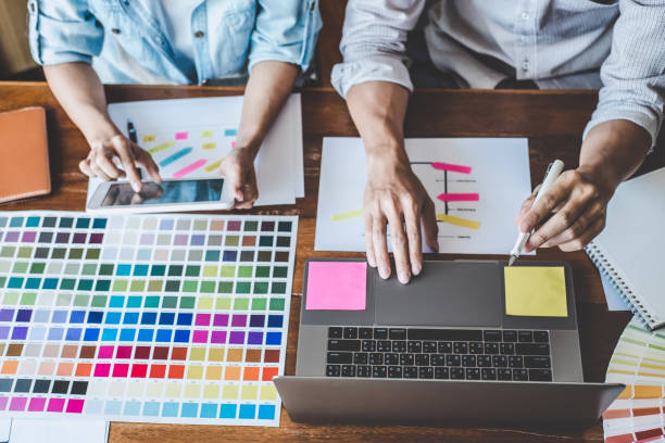 istock Team of Creative Web/Graphic Designer planning, drawing website ux app for mobile phone application and development template layout, process to developing prototype wireframe, User experience concept 1173129155