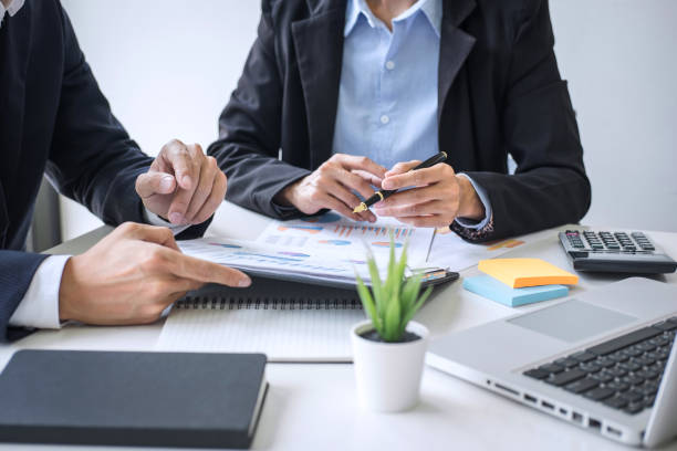 istock Business team colleagues discussing working analyzing with financial data and marketing growth report graph in team consultation to grow up profit, Meeting Talking Brainstorming Communication Concept 1173129366