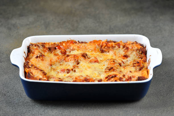 istock A dish of lasagna. Close-up. Dark background. 1173133417