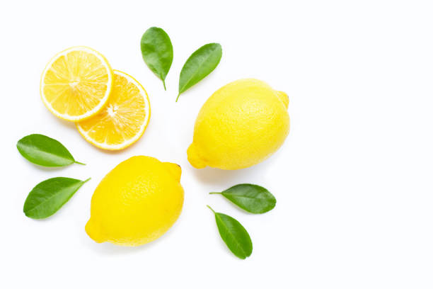 istock Lemon  and slices with leaves isolated on white. Copy space 1173133719