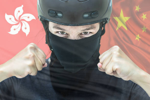 Hong Kong vs China protester. Flags.