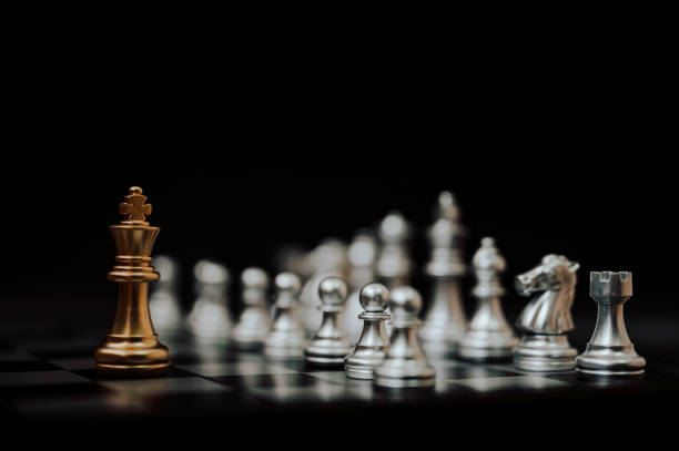 istock Business leader concept. Chess board game strategy planning and competition 1173135850