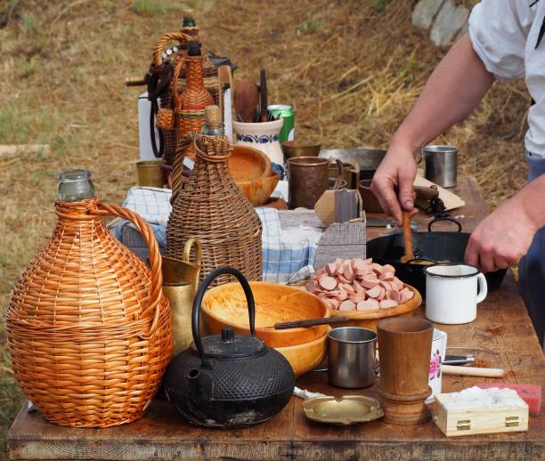 istock A cook prepares a sausage omelette using rustic kitchen utensils from the nineteenth century 1173135911