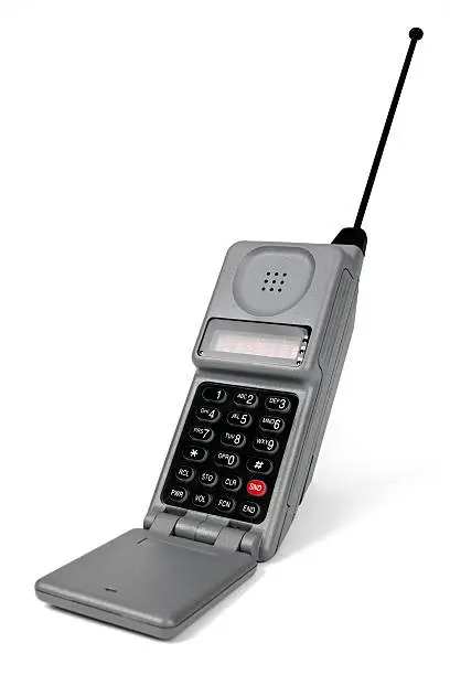 Photo of Retro gray mobile phone on a white background