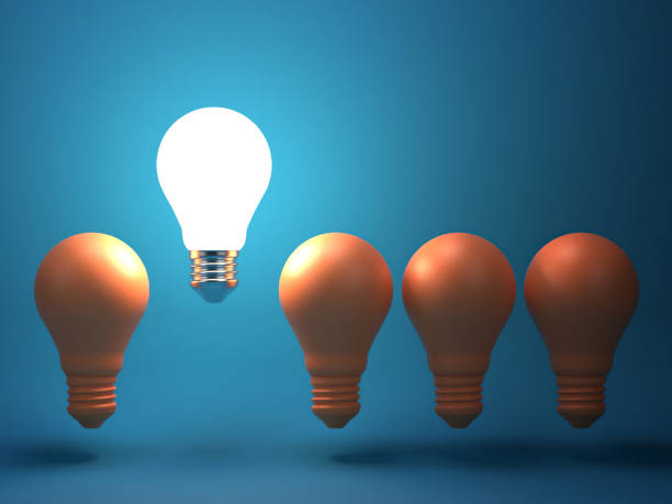 istock One glowing light bulb standing out from the unlit incandescent bulbs.individuality and different creative idea concepts . 3D rendering. 1173136133