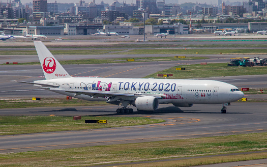 Japan, Tokyo - April 20, 2019: JAPAN, TOKYO - APRIL 20, 2019: Japan Airlines (JAL) passenger plane decorated with \