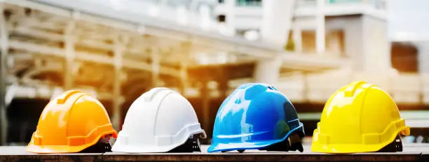 Quality contractor teamwork. Safety construction for engineer or building work site or plant. Wearing helmet and protective equipment can safe worker life in industrial work or plant. copy space
