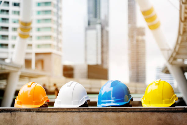 istock Quality contractor teamwork. Safety construction for engineer or building work site or plant. Wearing helmet and protective equipment can safe worker life in industrial work or plant. copy space 1173137472