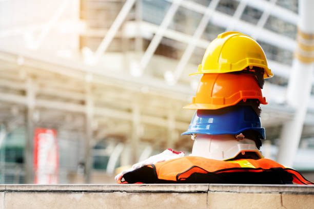 istock Quality contractor teamwork. Safety construction for engineer or building work site or plant. Wearing helmet and protective equipment can safe worker life in industrial work or plant. copy space 1173137482