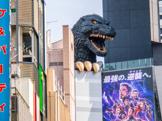 Godzilla looks out over the city stock photo