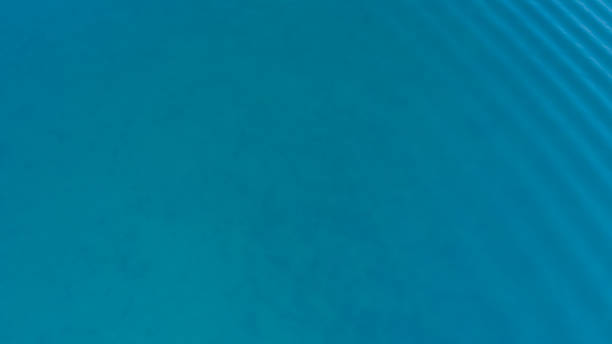 istock Sea blue water surface texture background, aerial view, vacation travel concept 1173140127