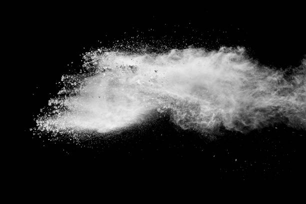 istock White powder explosion clouds.Freeze motion of white dust particles on black background. 1173140212