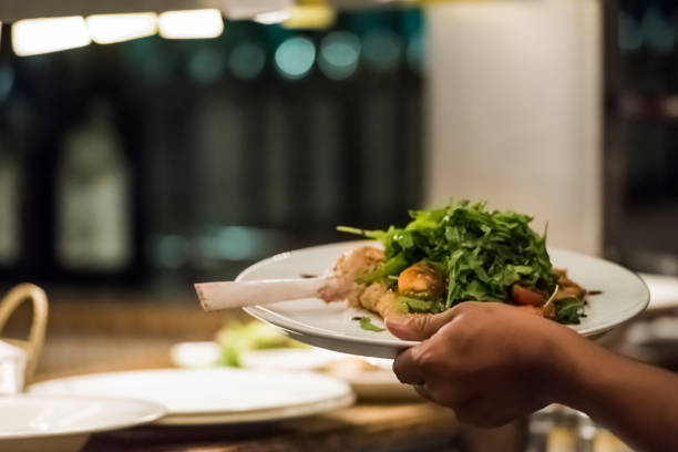 istock Chef preparing food at the kitchen 1173140605