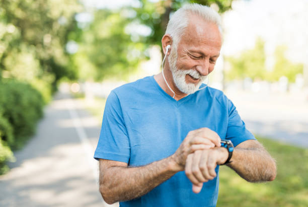 istock Happy sporty senior man using a smart sport watch. 1173140657