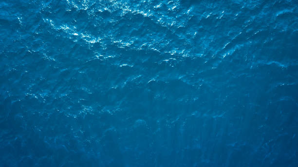 istock Sea blue water surface texture background, aerial view, vacation travel concept 1173140700