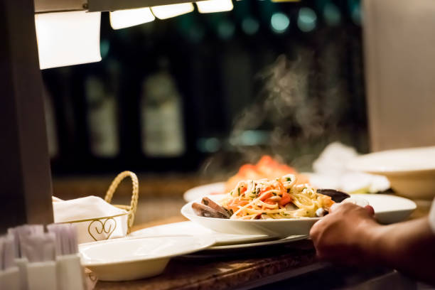 istock Chef preparing food at the kitchen 1173140718