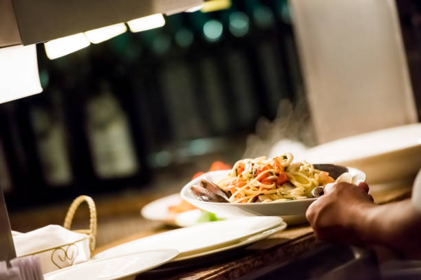 istock Chef preparing food at the kitchen 1173141664
