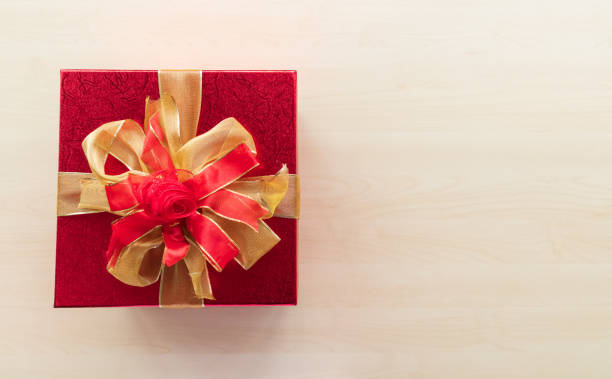 istock Gift box and Santa Claus hat on the table 1173144892