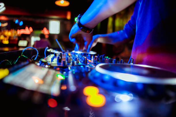 istock glowing lights from DJ mixer music remote buttons 1173145232