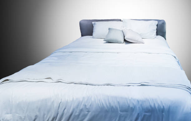 istock Big comfortable double bed in bedroom, Backgrounds 1173146599