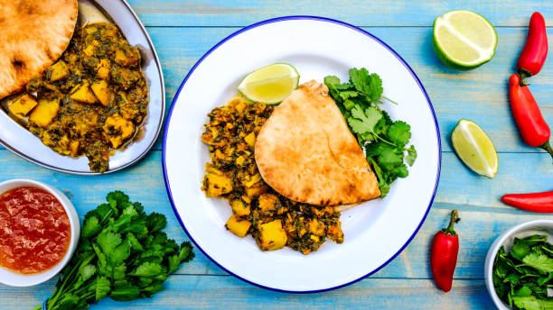 istock Indian Vegetarian Curry With Coriander and Flat Bread 1173147932
