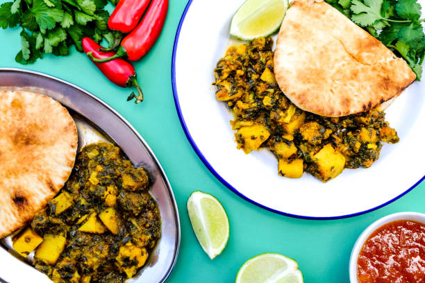 istock Indian Vegetarian Curry With Coriander and Flat Bread 1173147937