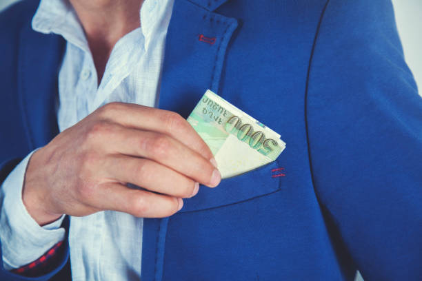 istock man hand money on  pocket 1173153887