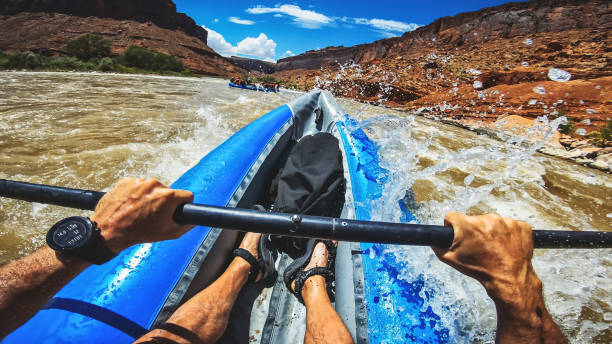 istock POV  rafting with kayak in Colorado river, Moab 1173154517