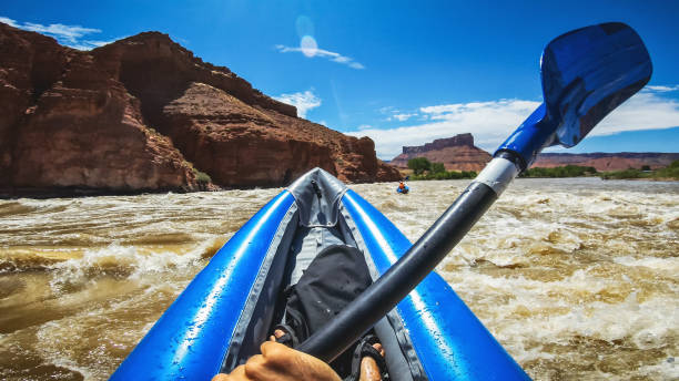 istock POV  rafting with kayak in Colorado river, Moab 1173154547
