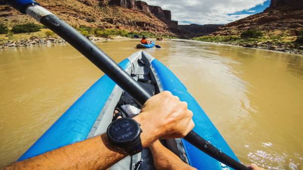 istock POV  rafting with kayak in Colorado river, Moab 1173154562