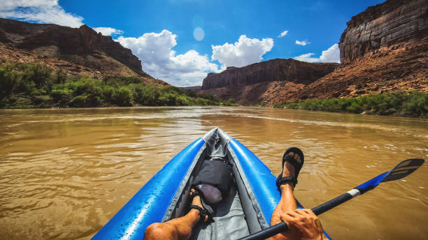 istock POV  rafting with kayak in Colorado river, Moab 1173154563