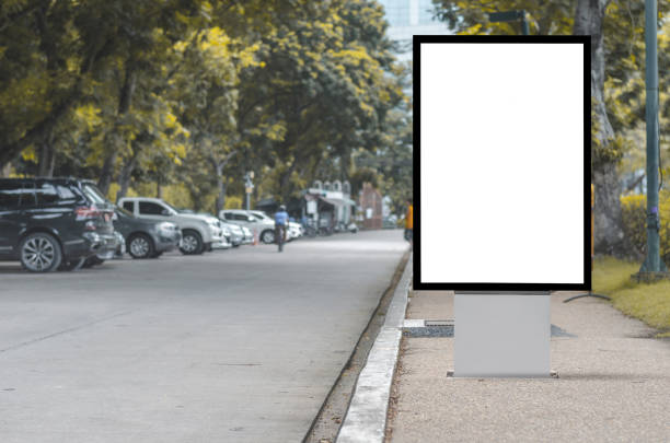 istock led blank billboard white screen side road in city. ad mockup copy space for advertising banner near bus stop in metropolis. 1173155367