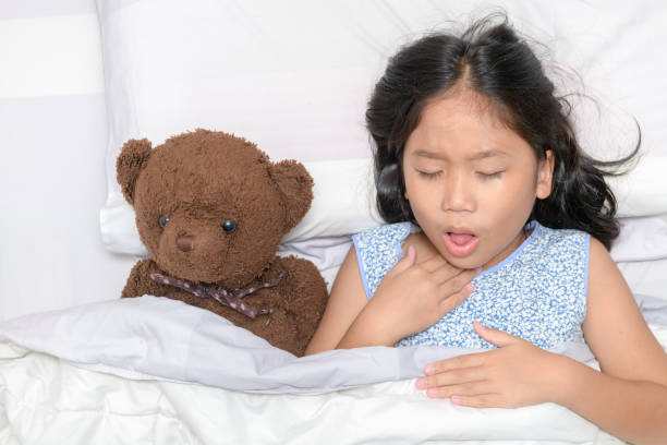 little girl is coughing and sore throat - allergy sneezing cold and flu flu virus imagens e fotografias de stock