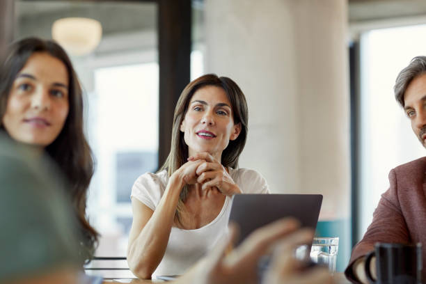 istock Entrepreneurs listening during meeting in office 1173155755