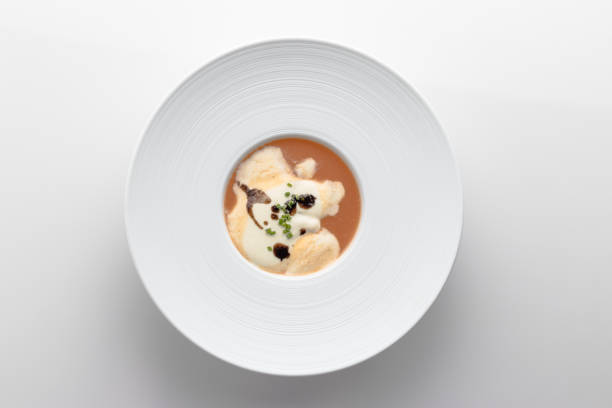 istock Vegetable and red fish soup with cream and parsley 1173155811