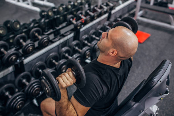 istock Strong male athlete exercising 1173156091
