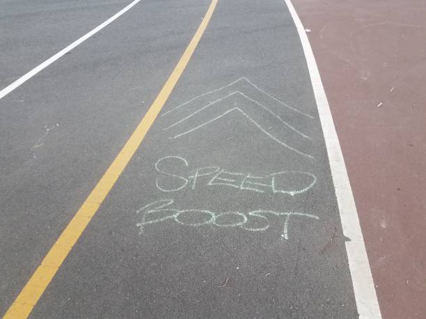 istock asphalt bike trail or path with speed boost and arrows on the ground 1173156239