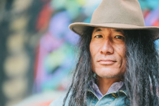 istock Portrait of confident man with dreadlocks 1173156261