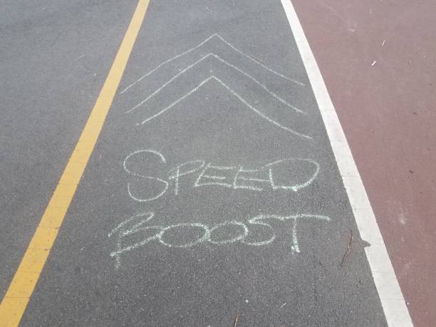 istock asphalt bike trail or path with speed boost and arrows on the ground 1173156264