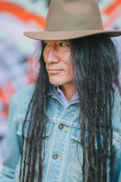 istock Portrait of confident man with dreadlocks 1173156318