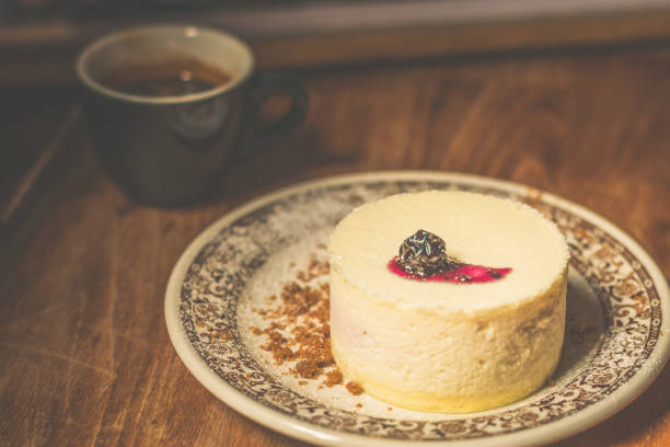 istock white chocolate cake and raspberry and nut crumbs served on a small plate 1173157344