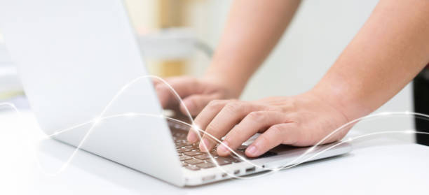 istock close up network engineering man typing on keyboard laptop to access internet with virtual interface fiber optical   telecommunication to exchange data information in the cyber network for business and futuristic technology communication concept 1173158596
