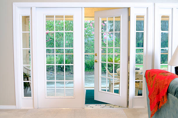 Open White French Doors Without Curtains Open White French Doors Without Curtains patio doors stock pictures, royalty-free photos & images