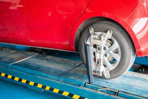 istock Car wheel alignment in progress at auto repair service centre 1173159892